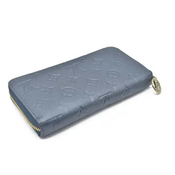 Louis Vuitton LV Monogram Empreinte Leather Zippy Wallet - Picture 4 of 14